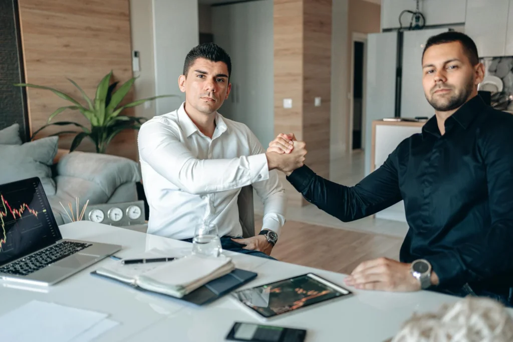 Business Partnership Handshake Computer